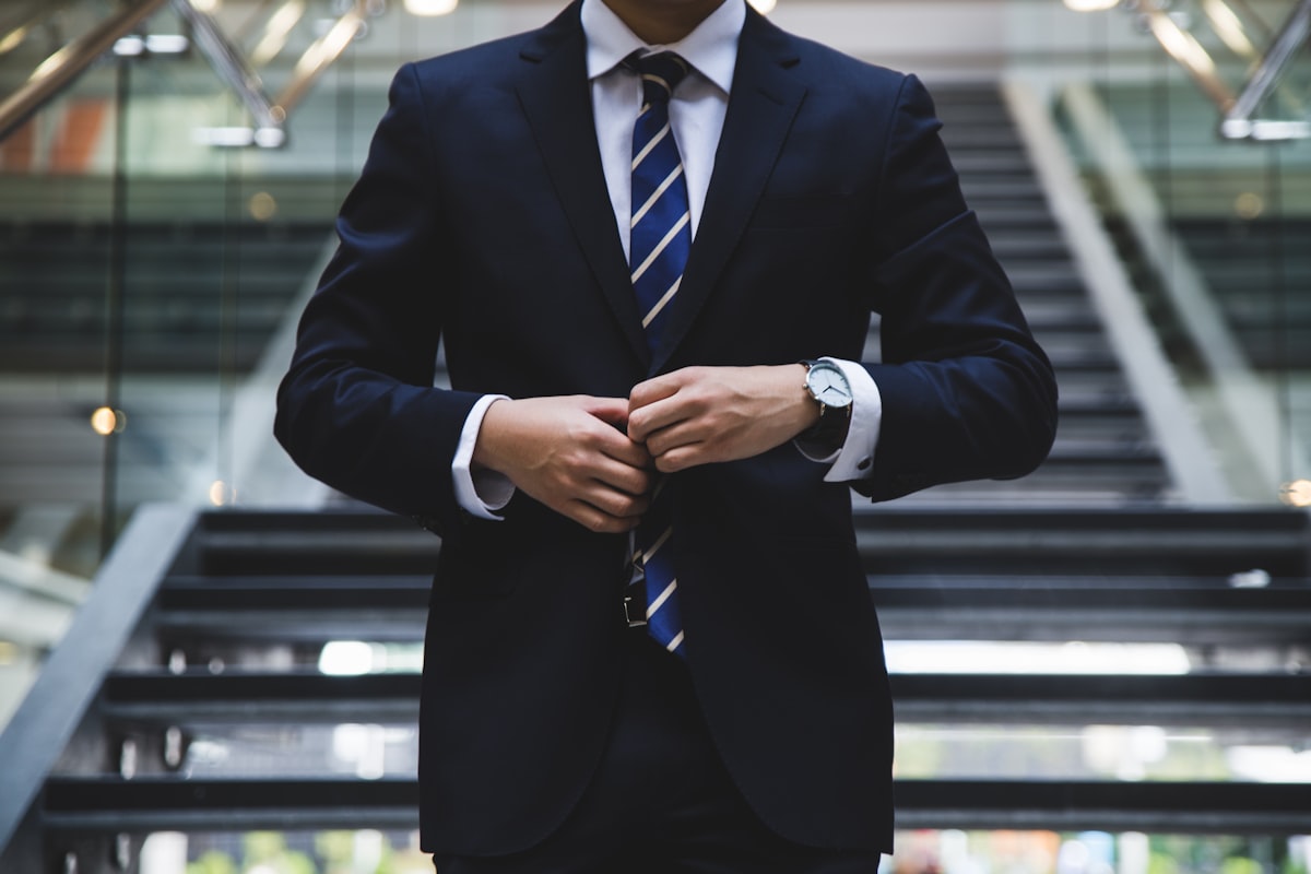 Business owner preparing equipment finance documents at office desk